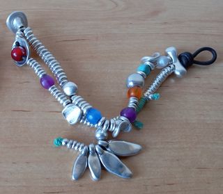 1 PULSERA LIBÉLULA O MARIPOSA DE 1 DE 50 NUEVA.