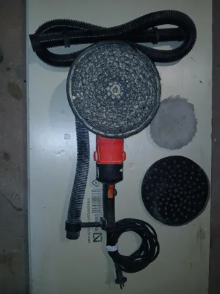 Lijadora profesional Faber con manguera y discos.