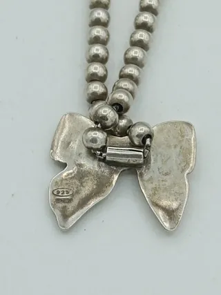 Bracciale sfere argento 925 con fiocco dorato