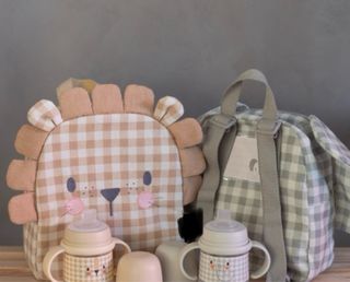 Mochila infantil diseño león y elefante