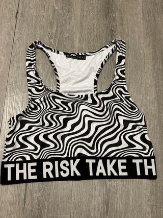 Top deportivo estampado THE RISK TAKE TH