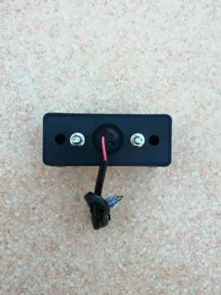 Piloto luz de matrícula con catadióptrico