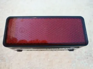 Piloto luz de matrícula con catadióptrico