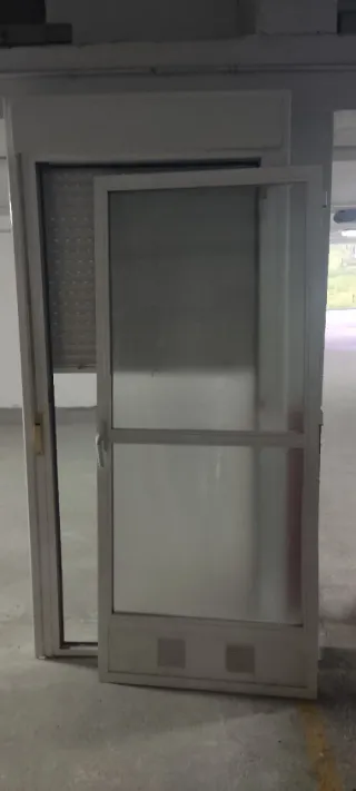 Ventana aluminio con persiana y coimalit