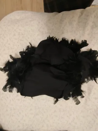 Minifalda Stradivarius plumas fiesta