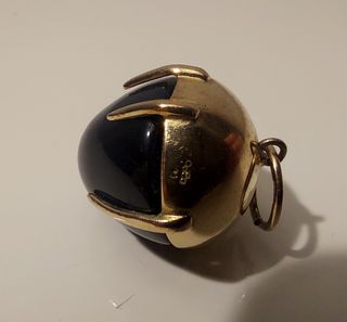 Colgante oro amarillo 18K con ónix negro y 2 sello