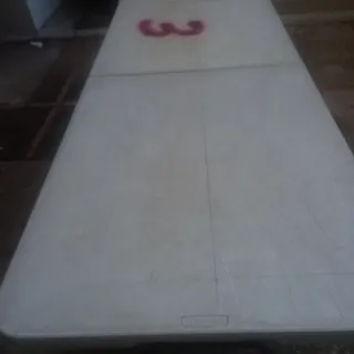 Tavolo pieghevole in plastica grigio