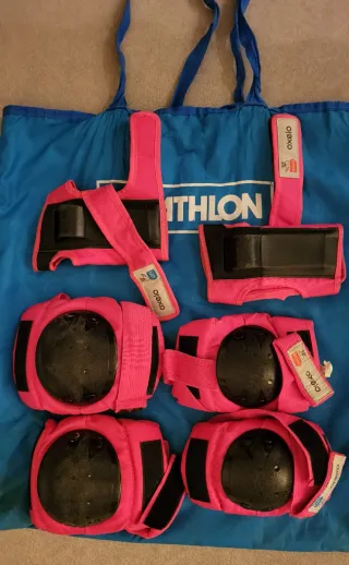 Protecciones patinaje/monopatín rosa Oxelo