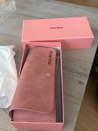 Gafas Miu Miu Negras y Doradas