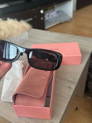 Gafas Miu Miu Negras y Doradas