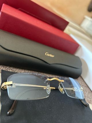 Occhiali Cartier Oro e Nero
