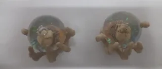 Coppia sfere di vetro con teschio