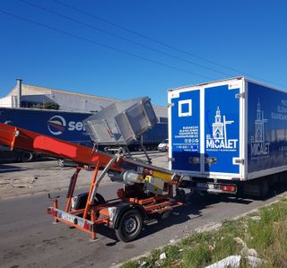 Máquina con escalera