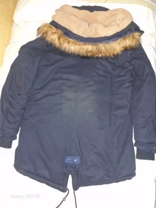 Chaqueta azul con capucha y pelo Nueva