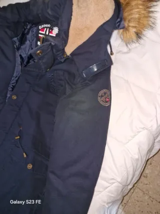 Chaqueta azul con capucha y pelo Nueva