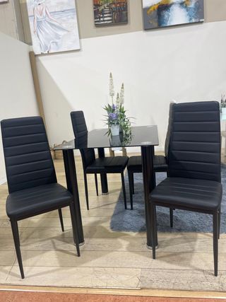 Conjunto comedor cristal y 4 sillas negras