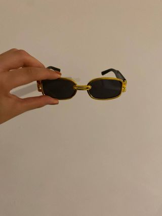 Occhiali da sole vintage oro e neri