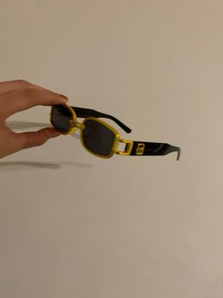 Occhiali da sole vintage oro e neri