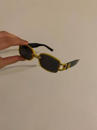 Occhiali da sole vintage oro e neri