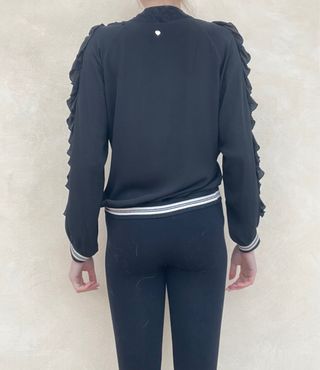 Blusa Eclipse nera con rouches