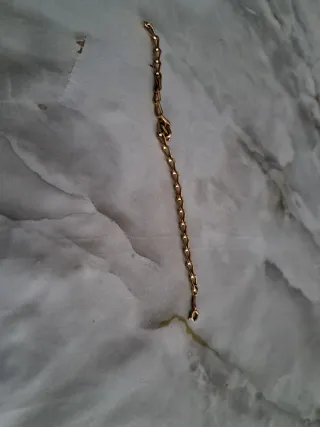 Pulsera Oro 9 kilate Me es pekeña juvilada..