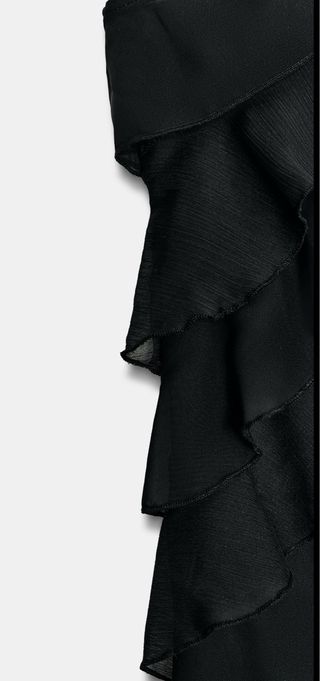 Top asimétrico volantes ZARA TallaM. NUEVO.