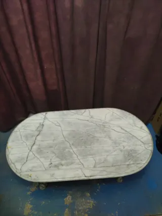 Mesa de forja y mármol ovalada