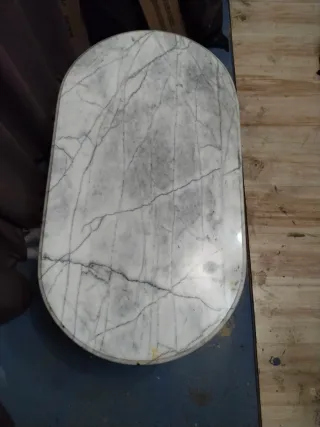 Mesa de forja y mármol ovalada