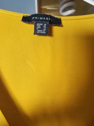 Camisa amarilla manga farol