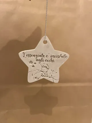 Targhetta in gesso decorata