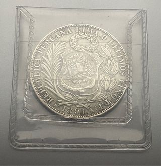 1 Sol 1891, Perú. Resello 1/2 real Guatemala 1894