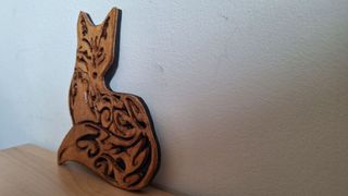 Volpe in legno traforato a mano. 14x16x0,7 cm.