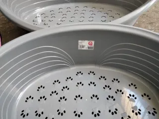 Cama para perros y transportín rosa