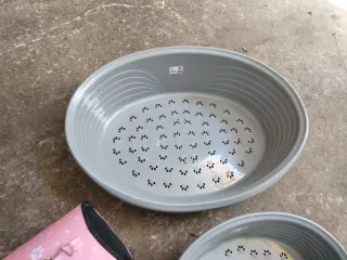 Cama para perros y transportín rosa