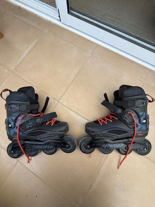 Patines Rollerblade Negros y naranjas