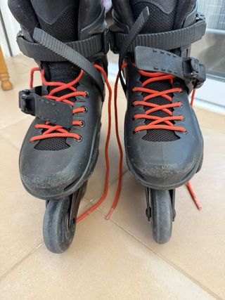 Patines Rollerblade Negros y naranjas