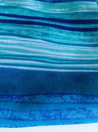 Pañuelo en tonos azules y turquesa