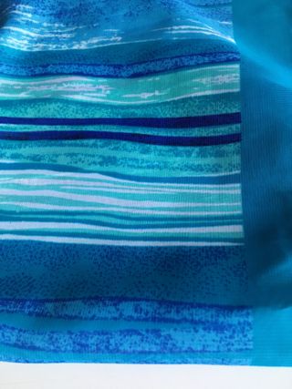 Pañuelo en tonos azules y turquesa