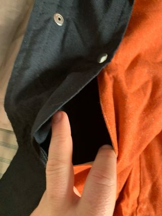 Chaquetón largo ignífugo negro y naranja