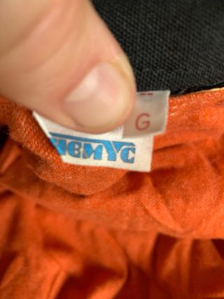 Chaquetón largo ignífugo negro y naranja