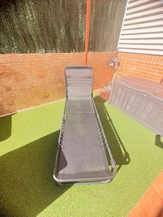 Tumbona plegable negra