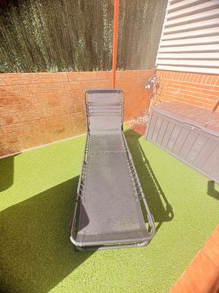 Tumbona plegable negra