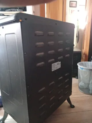 Estufa eléctrica tipo chimenea negra