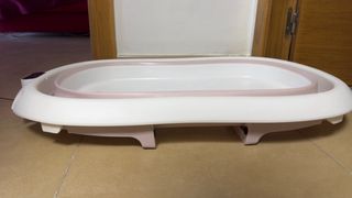Bañera bebé plegable rosa con termometro.