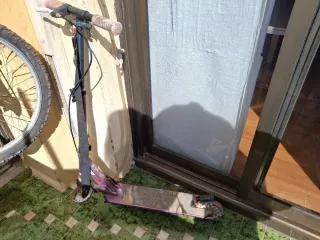 Patinete plegable morado