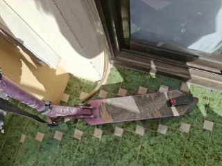 Patinete plegable morado