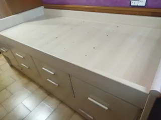 Cama alta individual con cajones