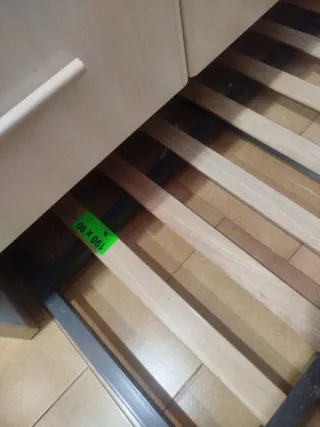 Cama alta individual con cajones