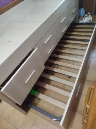 Cama alta individual con cajones