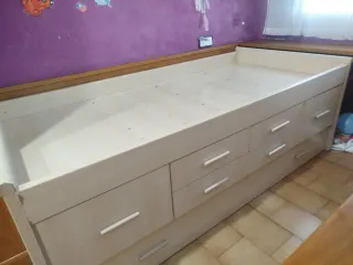 Cama alta individual con cajones